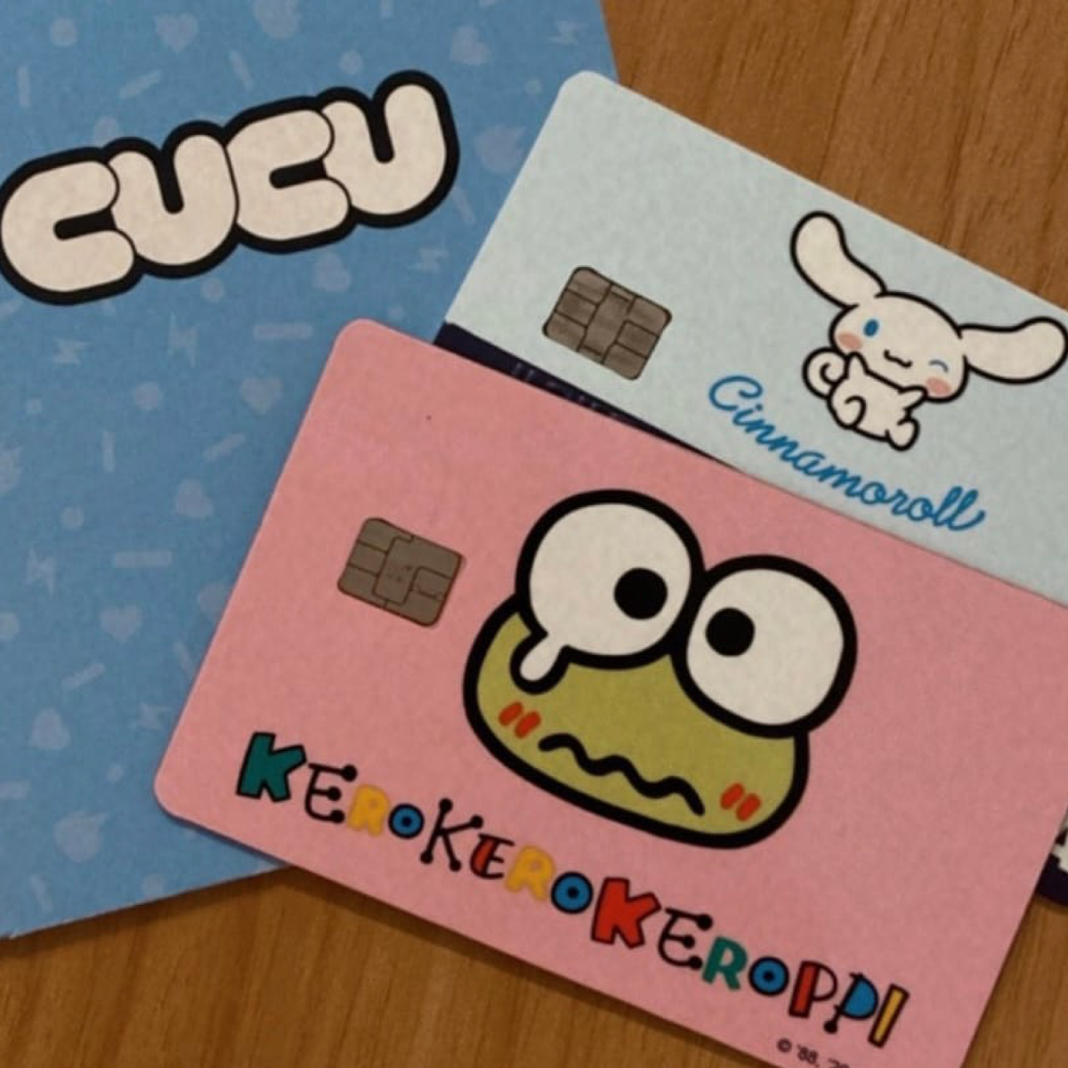 Customer showcasing their personalized Sanrio debit credit card skin
