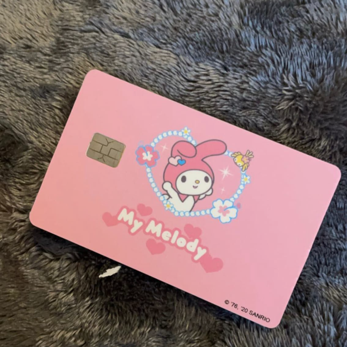 Customer showcasing their personalized my melody debit credit card skin